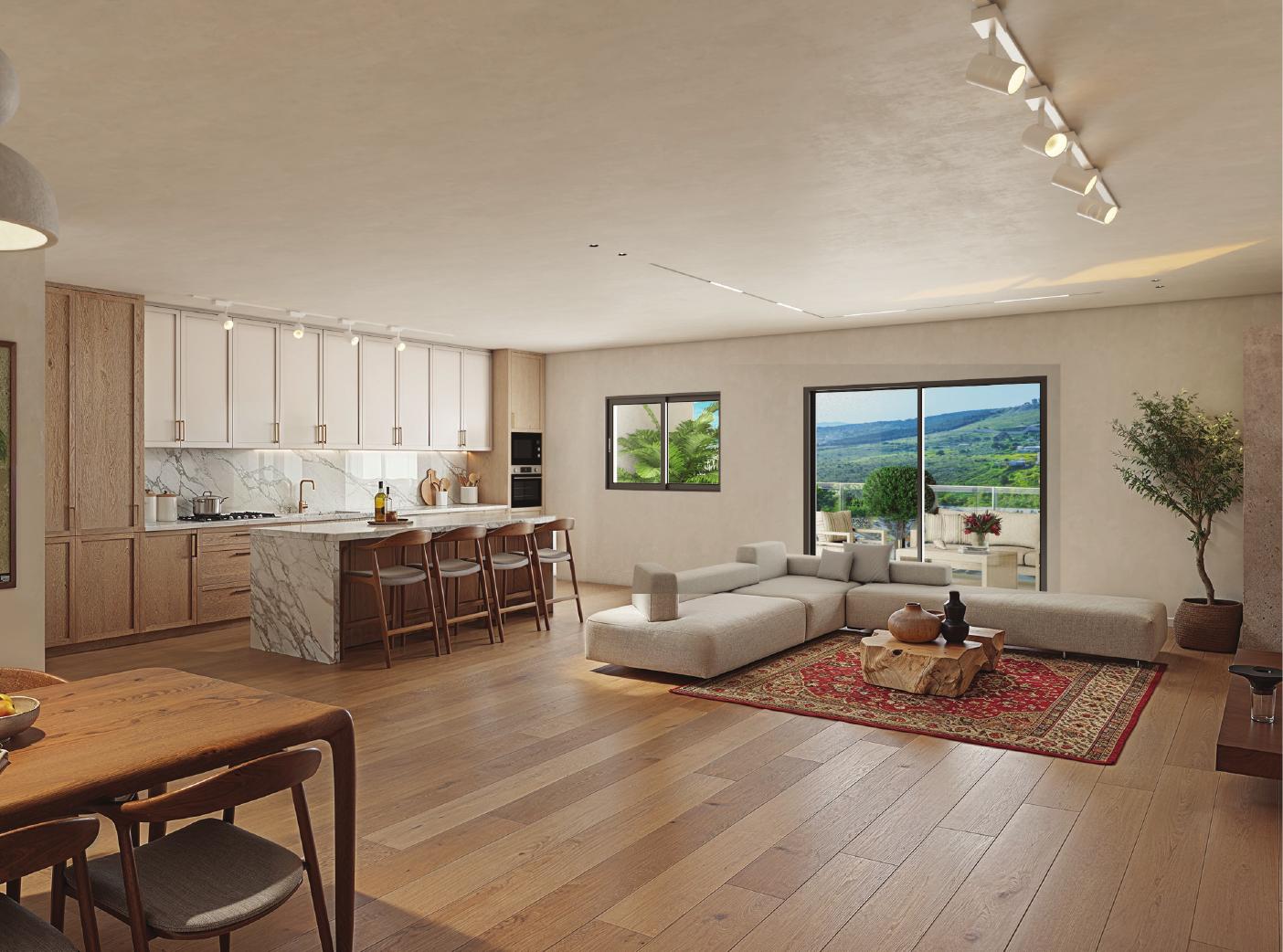 تصميم غرفة المعيشة والمطبخ المفتوح في G.LUXE